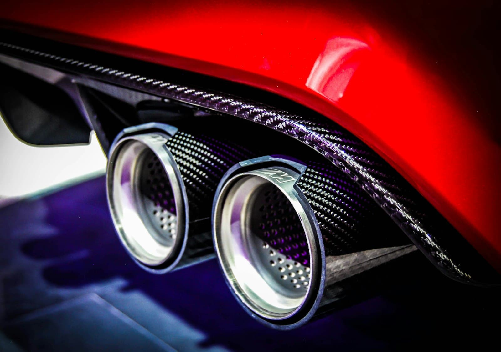 Close-up of a car's exhaust tips