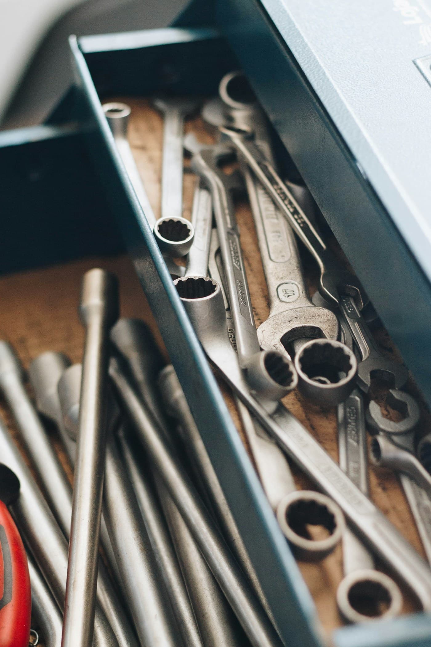 Drawer of wrenches and sockets in a workshop tool chest